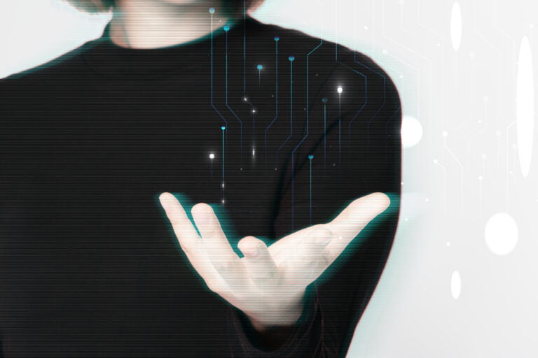 Glitching woman&rsquo;s hand background using futuristic technol